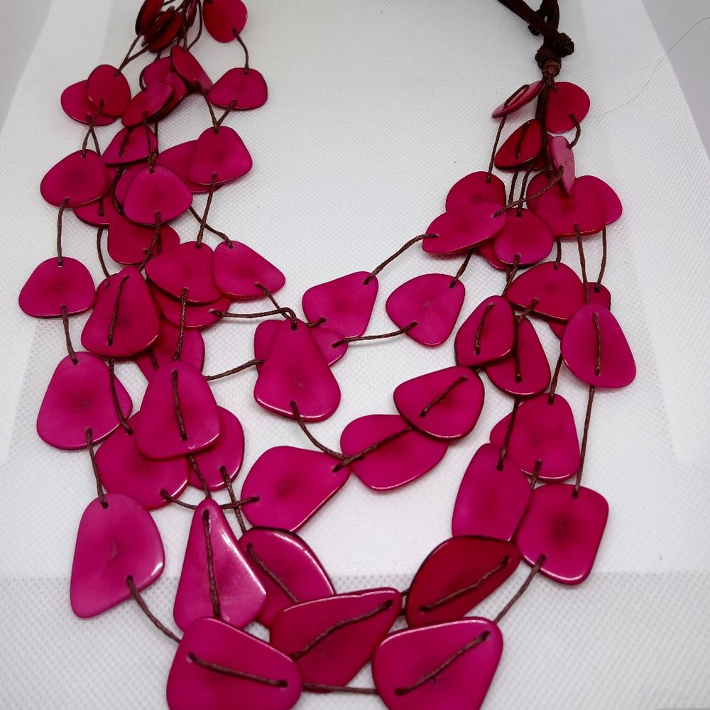 New Tagua necklaces by Soraya Cedeno in blue and fushia
